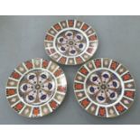 Three Royal Crown Derby china plates, decorated in the Imari palette  16.5"dia