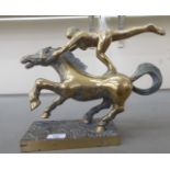 A cast brass model, a female figure, on horseback  11"h