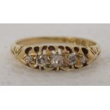 An 18ct gold ring, set with five diamonds
