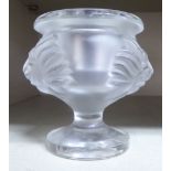 A modern Lalique glass pedestal candle holder, fashioned as an urn with opposing lion mask ornament