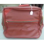 A Louis Vuitton Challenge Line Z red leather holdall