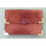 A Cartier red leather and velvet document holder  10" x 15"