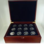 A set of eighteen British Five Pounds proof coins, in a tray fitted presentation case