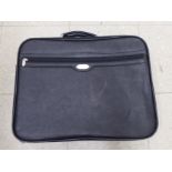 An Asprey black leather executive briefcase with multiple zipped compartments  13" x 17" x 4"
