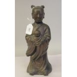A 19th/20thC Chinese cast bronze, standing, robed figure, holding a vase  12"h