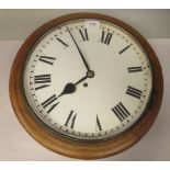 A late 19thC mahogany cased wall timepiece with a turned surround and brass bezel; the single