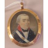 A 19thC mourning brooch, depicting head and shoulders of a uniformed naval officer, a lock of hair