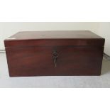 A mid Victorian mahogany writing slope with straight sides and a hinged lid, over a concealed side