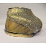 An Edwardian cast brass mounted horse's hoof inkwell with a hinged cap, inscribed 'Cordon Jan 30