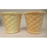 A pair of Royal Worcester blush ivory glazed china moulded baskets, highlighted in gilt  bearing