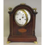 An Edwardian mahogany cased bracket clock with marquetry and applied brass ornament, straight