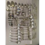 19thC silver fiddle pattern flatware, comprising eight table spoons, nine table forks, thirteen