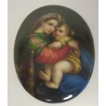 A Continental oval, painted porcelain plaque, featuring a mother and child  2" x 1.5"