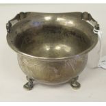 A 1920s Chinese Zee Sung silver engraved sugar basin of cauldron form with a flared rim and swing