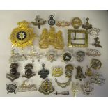 Approx. thirty-two military cap badges and other insignia, some copies: to include the 4th