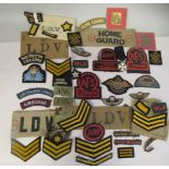 A collection of British, mainly World War II era military, civil defence and associated arm bands
