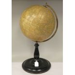 An early 20thC Geographia 10" terrestrial globe, showing railways and steamship routes, rotating