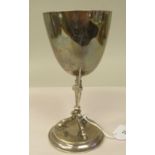 A late Victorian silver goblet with an ovoid shape bowl, on a spreading wings and trefoil