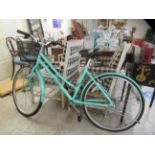 A ladies Ecosmo Elegant bicycle with seven gears and 22"wheels