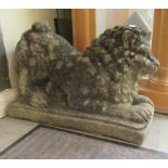 A composition stone terrace ornament, a recumbent lion  21"L