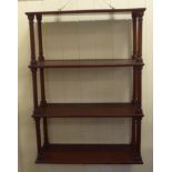 A set of four late 19thC mahogany hanging shelves with turned uprights  29"h  21"w