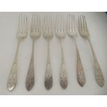 A set of six George III Irish silver dessert forks with bright-cut engraved stems  Dublin 1801
