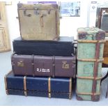 Early 20thC luggage: to include a canvas covered trunk of box design  17"h  18"w; and a beech bound,