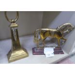 A late 19thC cast brass and painted iron door porter, fashioned as a prancing horse  9.5"h; and