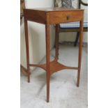 An Edwardian walnut and marquetry side table with a frieze drawer, raised on slender, square,