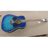 A Yamaha FG820, six string acoustic guitar, in a lacquered and toned blue case with a fitted black