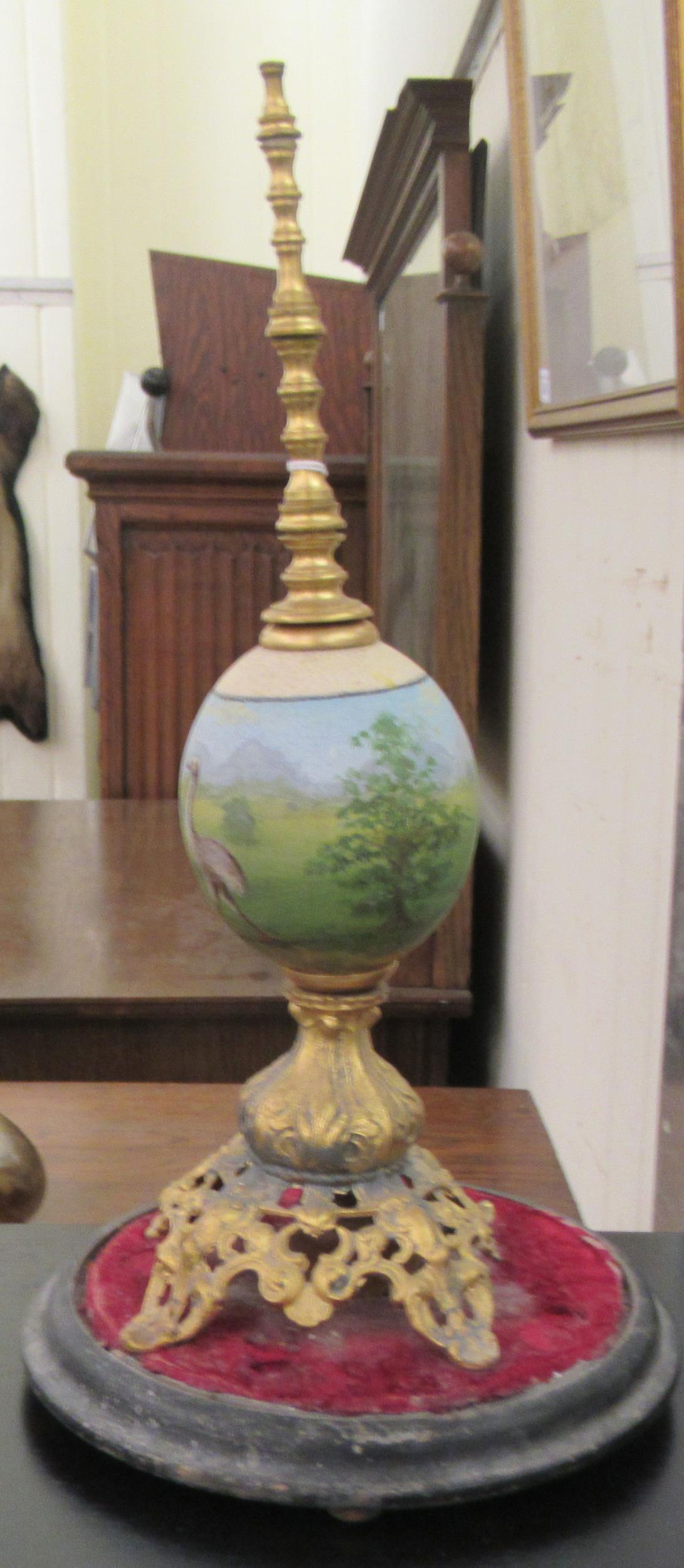 A late 19thC handpainted and gilt metal mounted emu egg centrepiece, on a circular plinth  17"h - Image 2 of 6