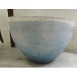 A modern washed pale blue and white stoneware jardinière of bowl design  12"h  16"dia