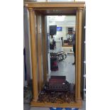 A modern beech and glazed display cabinet, on a plinth  79"h  42"w