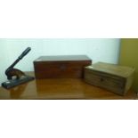 A 19thC mahogany writing slope with opposing brass handles and an angled, hinged lid, enclosing a