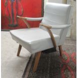 A 1960s chair, the low, level back, open arms and seat upholstered in pale grey vinyl, raised on