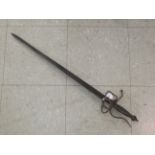 An 18thC Persian sword with a wire basket and engraved blade  23"L
