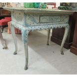 A 20thC Continental 'shabby chic' serving table, painted in shades of blue with floral and foliate
