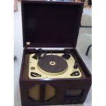 A Garrard model RC 88/4 schedule 52750/4 walnut cased record deck and radio  14.5"h  19"w