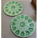 A pair of French green glazed majolica oyster plates  14.5"dia