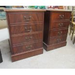 A pair of 20thC mahogany finished two drawer (fashioned as four facsimiles) filing cabinets with