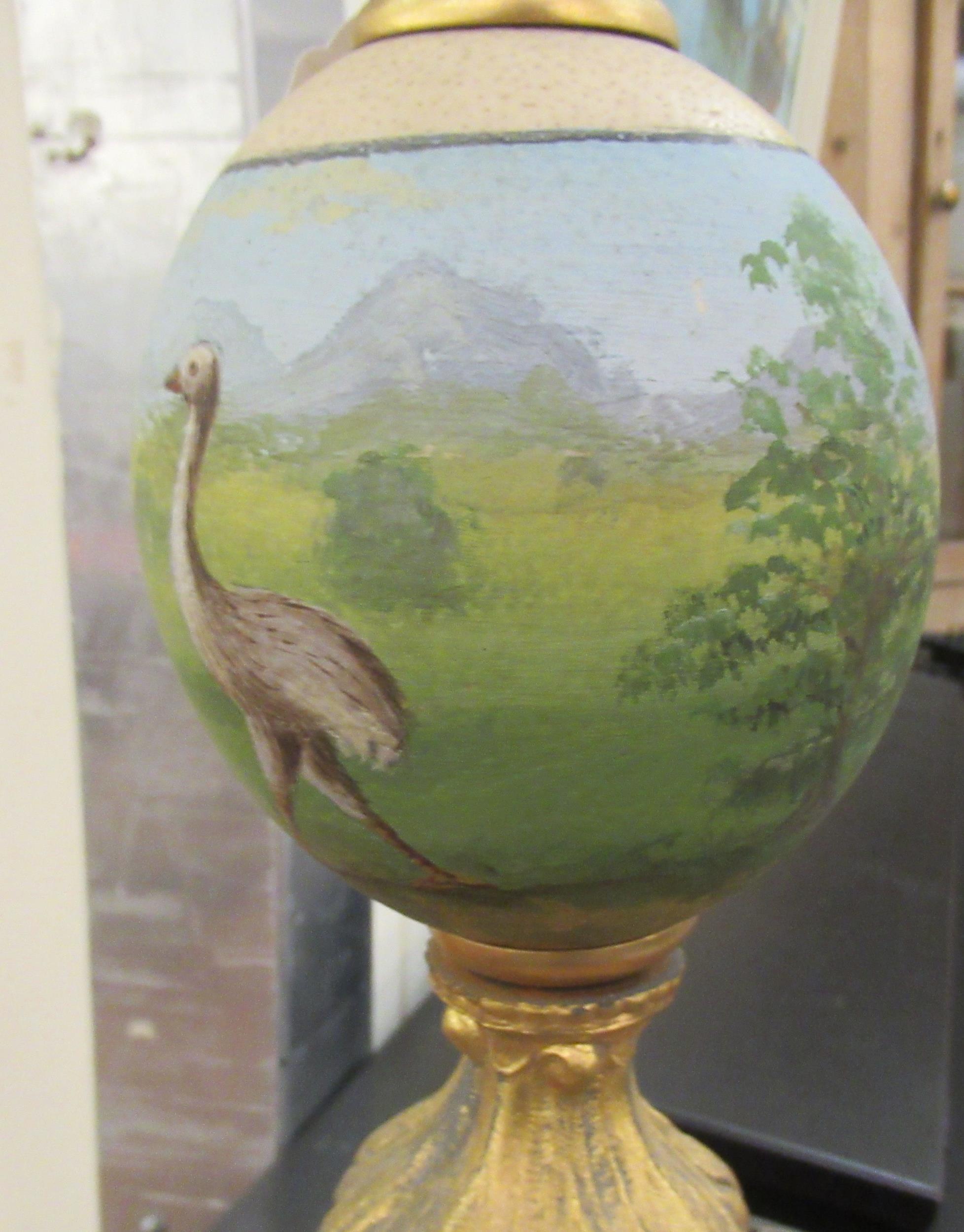 A late 19thC handpainted and gilt metal mounted emu egg centrepiece, on a circular plinth  17"h - Image 6 of 6