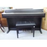 A GEM RealPiano RP800 digital electric piano, in a matt black case  36"h  55"w with a matching stool