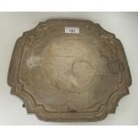 A silver salver with a raised piecrust border, elevated on pad feet  Sheffield 1968  10.5"sq