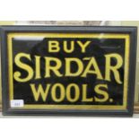 A glass advertising sign 'Buy Sirdar Wools'  yellow on black  13" x 8"  framed