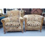 A circa 1930s stained beech showwood framed, fabric covered, enclosed wingback armchair; and another