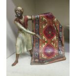 In the manner of Bergman, a cold painted cast bronze figure, a carpet seller  6"h