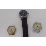 Three variously cased wristwatches, one with a strap