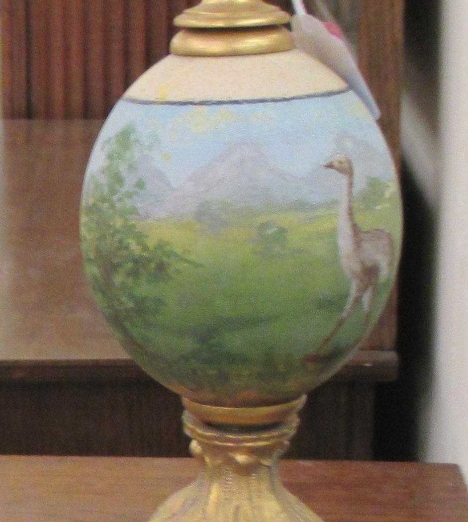 A late 19thC handpainted and gilt metal mounted emu egg centrepiece, on a circular plinth  17"h - Image 3 of 6