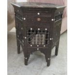 A late 19th/early 20thC North African stained and carved hexagonal side table, incorporating