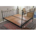 A modern Victorian style tubular brass bedframe, the headboard  69"w